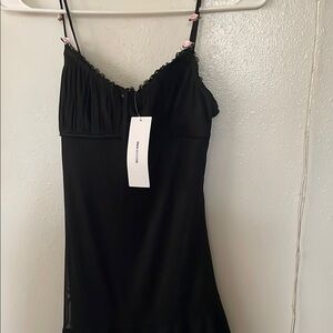 Black Mini Dress with rosette strap detailing and lace